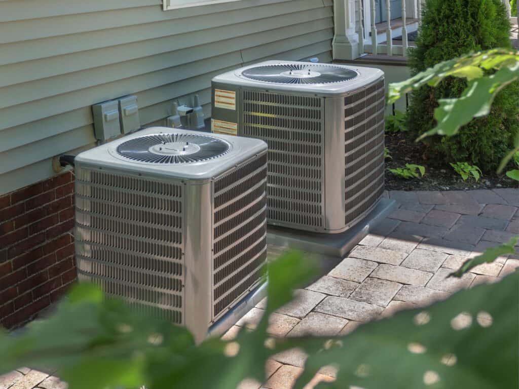 Image of HVAC units. Conventional HVAC or a Heat Pump: Which Is Better?